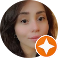 Woman with subtle smile, orange star icon.